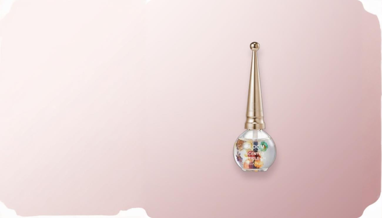 SEN SPA Bloom scented cuticle oil bottle with suspended flowers
